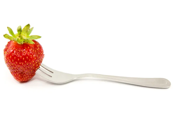 Strawberry on a fork. — Stock Photo, Image