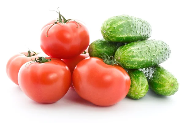 Fresh raw tomatoes and cucumbers. — Stock Photo, Image