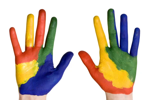 Τα χέρια του παιδιού βαμμένα σε πολύχρωμα χρώματα. — Φωτογραφία Αρχείου