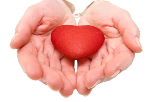 Mãos coração vermelho em uma mulher. — Fotografia de Stock