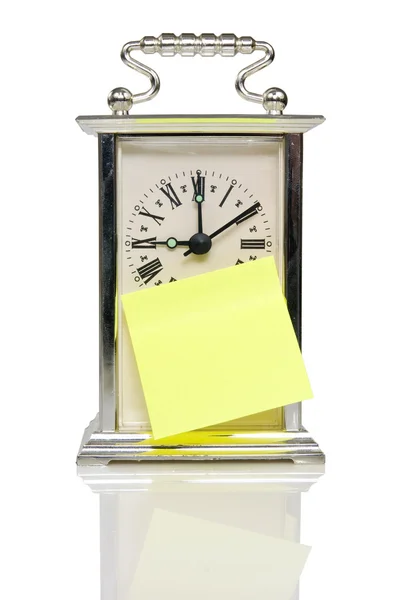 Old clock with sticky paper — Stock Photo, Image