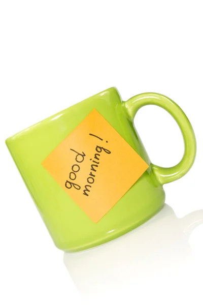 Green cup with note "good morning!". — Stock Photo, Image