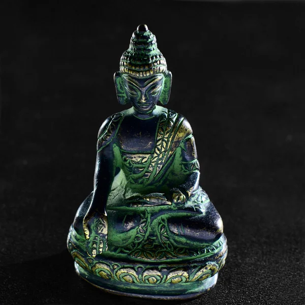 Bronze Buddha statue on black background — Stock Photo, Image