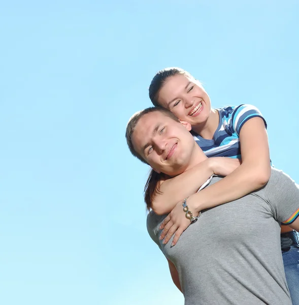 Happy couple on sky background — Stock Photo, Image
