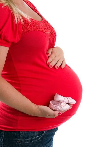 Pregnant Holding Baby Shoes — Stock Photo, Image
