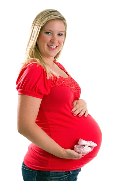 Těhotná s botičky — Stock fotografie