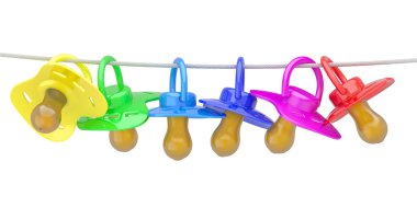 Row of babies dummies on rope. clipart