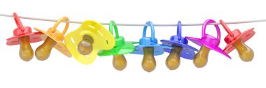 Row of babies dummies on rope. clipart