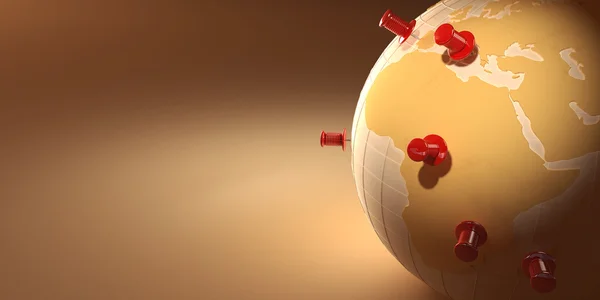 Dünya ve turuncu zemin üzerine raptiye — Stok fotoğraf