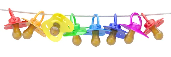 Reihe von Babypuppen am Seil. — Stockfoto