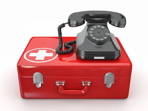 Helpline.Services. Phone on medical kit — Stock Photo, Image