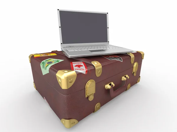 Laptop en koffer — Stockfoto