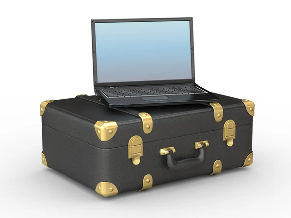 Laptop ve bavul — Stok fotoğraf