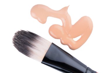 Beige liquid foundation makeup with brush clipart