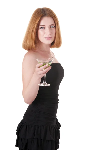 Vrouw in zwarte jurk met een drankje — Stockfoto