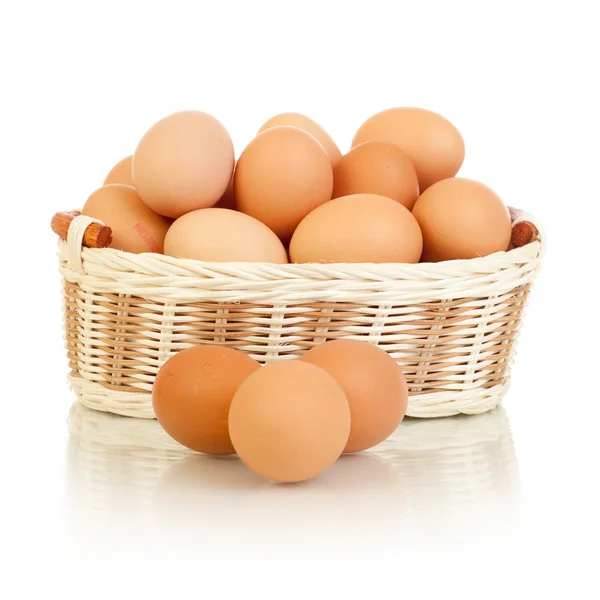 stock image Eggs in basket isolated on white