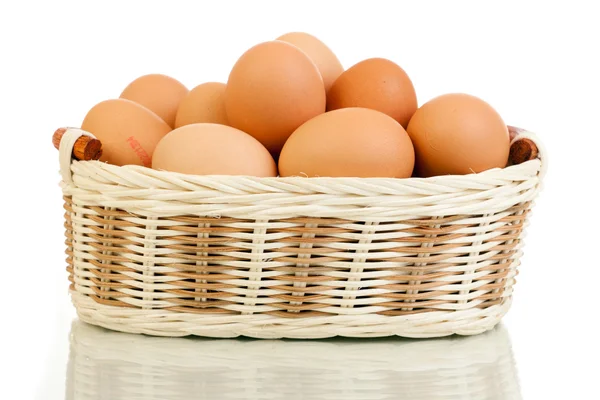 stock image Eggs in basket isolated on white