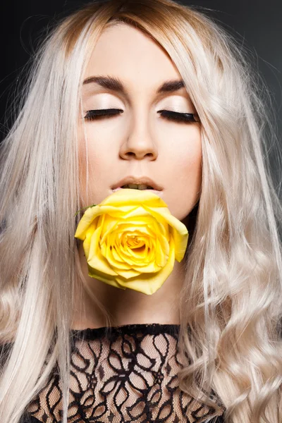 Elegant fashionable woman with rose — Stock Photo, Image