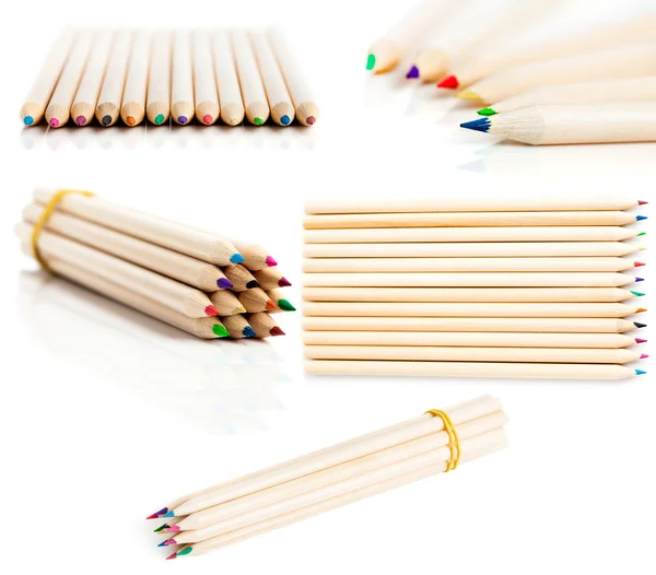 Many colored pencils in row over white background — Stock Photo, Image