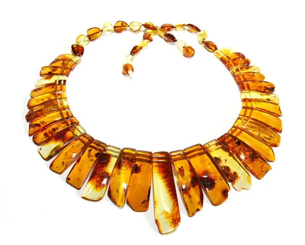 Baltic amber necklace isolated on white — Stock Photo, Image