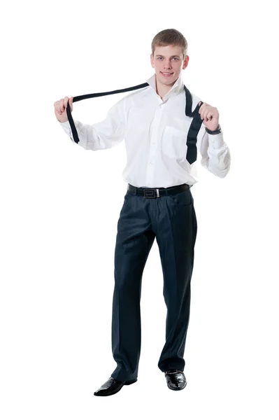 O homem de negócios jovem Fixa uma gravata — Fotografia de Stock