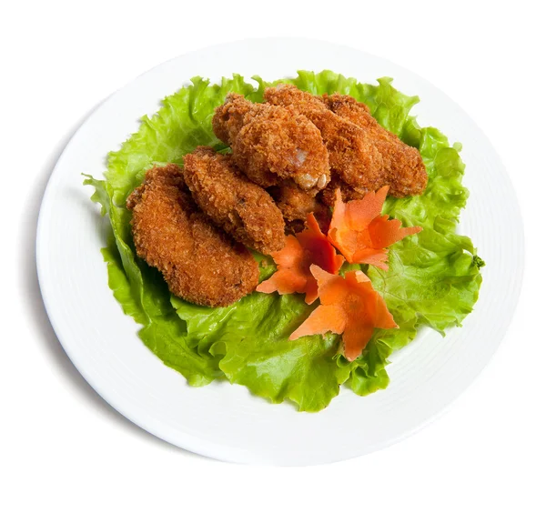 stock image Battered chicken wings on a plate