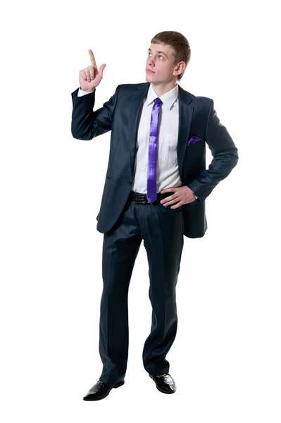 El joven hombre de negocios con traje muestra una mano hacia arriba —  Fotos de Stock