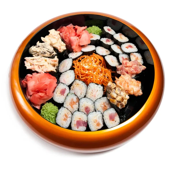 Set of sushi in wooden circle plate