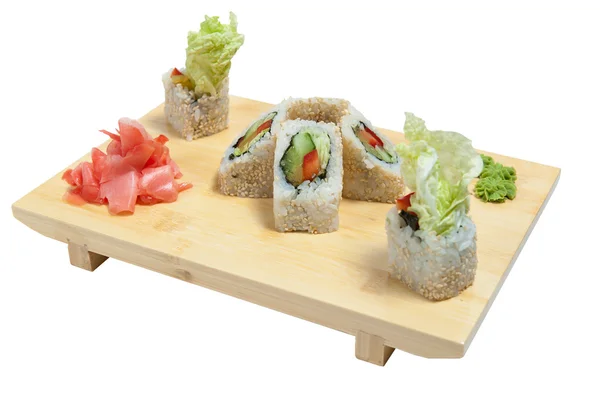 Sushi en soporte de madera —  Fotos de Stock
