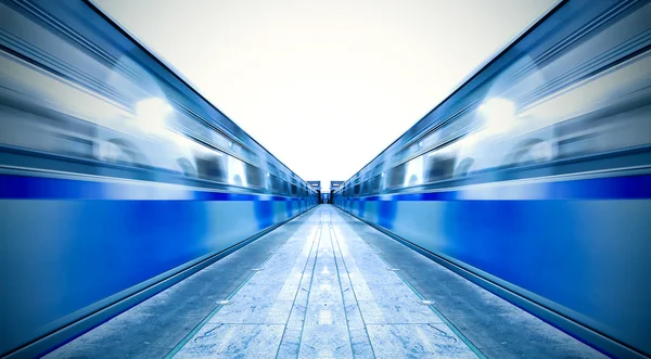 stock image Symmetric vanishing platform with leaving trains