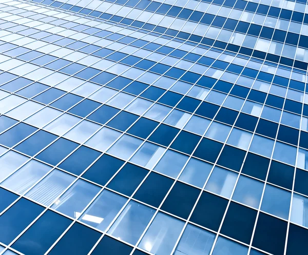 Modern green glass skyscraper perspective view — Stock Photo, Image