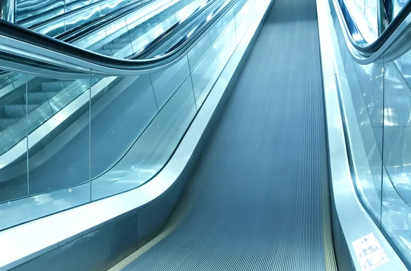 Footsteps of escalator in airport prspective view — Stock Photo, Image