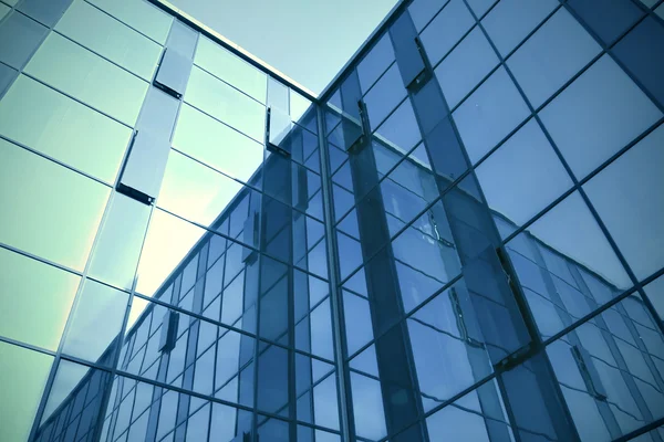 Modern blue glass skyscraper perspective view — Stock Photo, Image