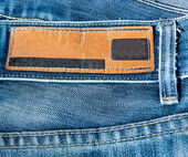 modré džíny s popiskem prázdné kůže