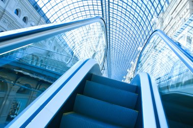 Blue escalator in motion clipart