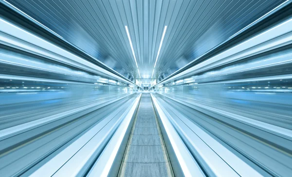 Futuristic escalator inside contemporary airport — Stock Photo, Image