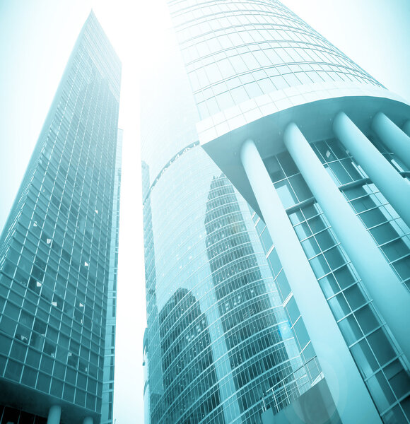 Modern glass silhouettes of skyscrapers at night