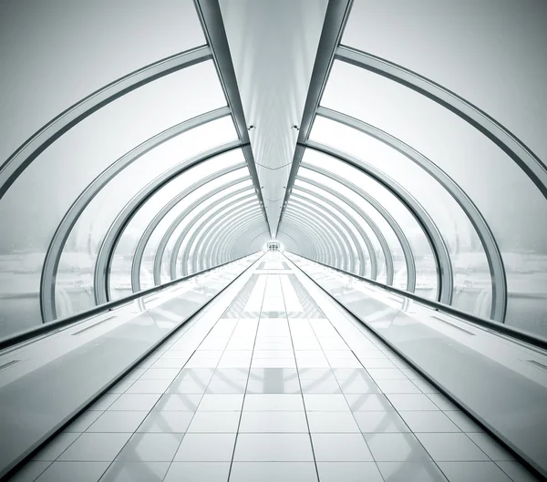 Black symmetric vanishing corridor with bent wall — Stock Photo, Image