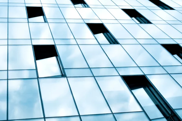 Glass surface of contemporary angle of business building — Stock Photo, Image