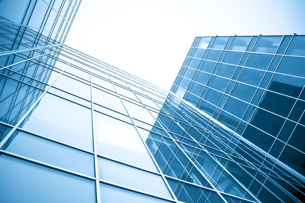 Prospective view to glass high-rise building skyscrapers at near
