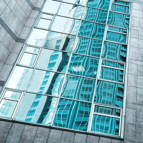 stock image Glass surface of contemporary angle of business building