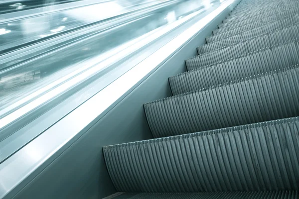 Abstract striped texture of moving escalator closeup — Stock Photo, Image
