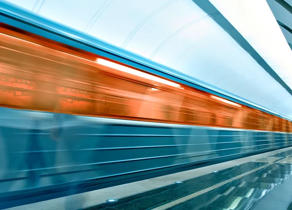 Wide angle view of modern metro station with train motion — Stock Photo, Image