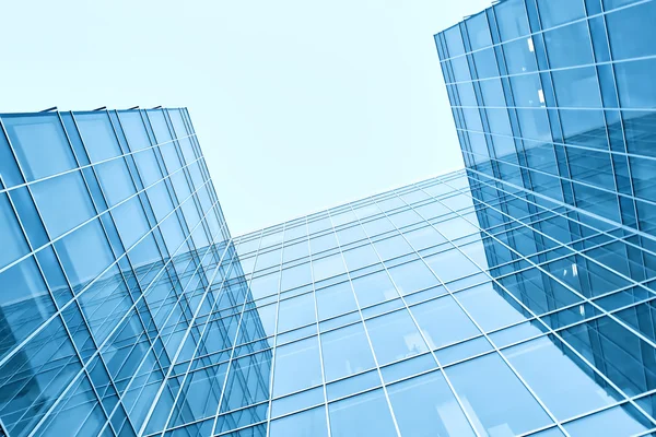 Сучасні скляні хмарочоси будівлі вранці — стокове фото
