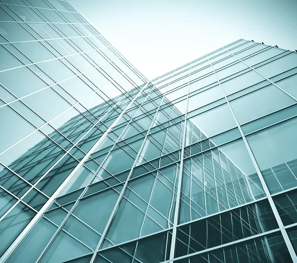Moderna blått glas mur av skyskrapor — Stockfoto