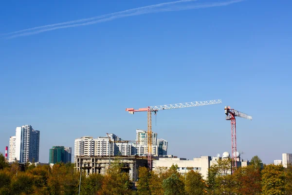 Panoramic view to modern buildings under construction — Stock Photo, Image