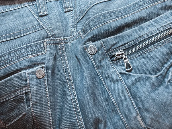 蓝色口袋牛仔裤商业背景 — 图库照片