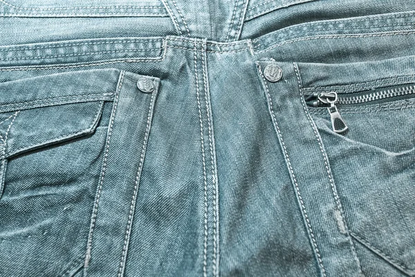 蓝色口袋牛仔裤商业背景 — 图库照片