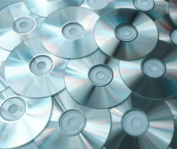 Modré pozadí kompaktních disků — Stock fotografie