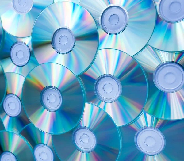 Kleurrijke achtergrond van compact discs — Stockfoto